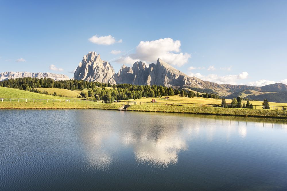 Lake and mountains, Alpe di Siusi or Seiser Alm, Dolomites Alps, Italy