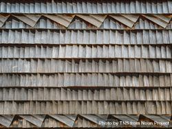Weathered wood shingle-clad exterior wall of an Swiss chalet 41lpLp