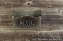 Empty old metal mailbox on weathered wood 5rwQl4