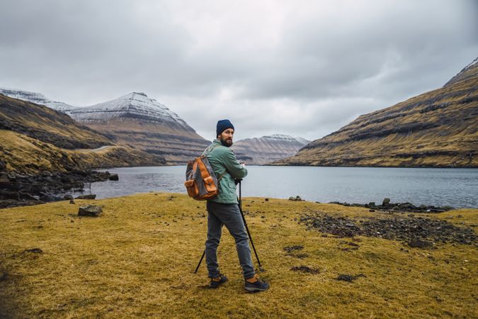 Back view of man photographing outdoors