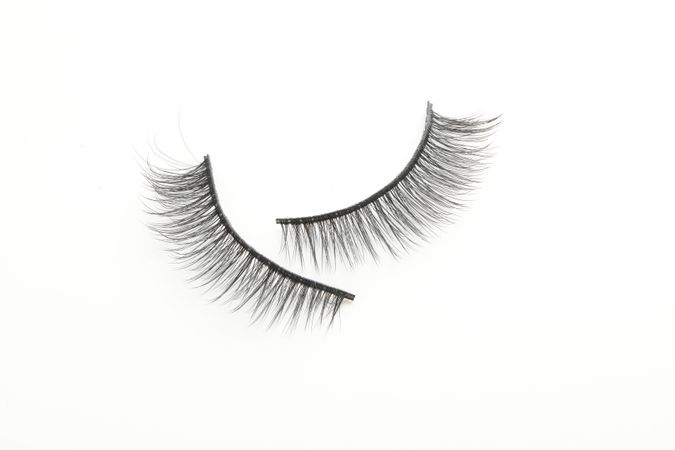 false eyelashes, isolated on light background