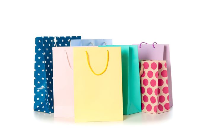 Multicolor paper bags isolated on blank background