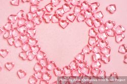 Clear hearts on pink background making the shape of heart 5o93Qb