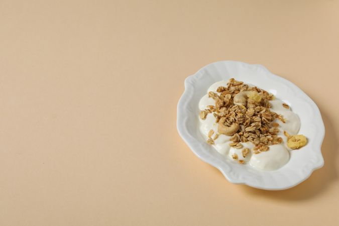 Tasty and nutritious breakfast concept - muesli with yogurt