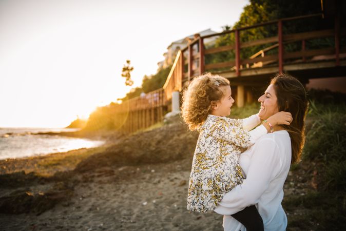 Mother with her daughter at beach