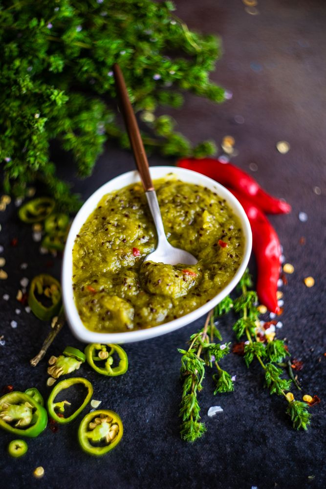 Close up of spicy traditional Georgian satsebeli sauce with spoon