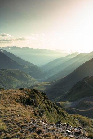 Mysterious mountain high in row in sunlight