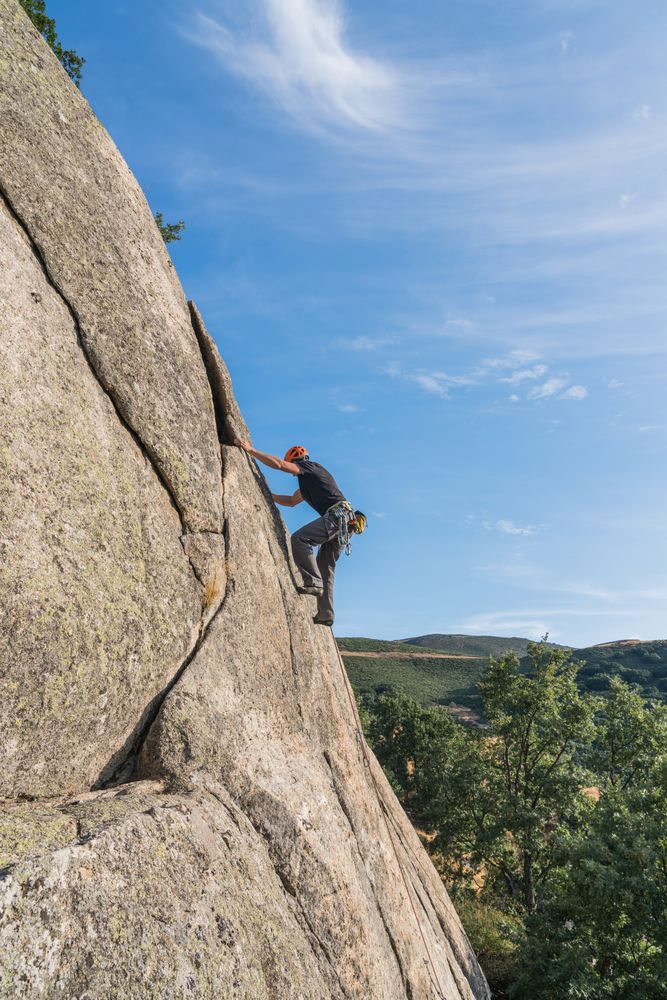 Man climbing a rock