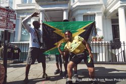 London, England, United Kingdom - August 25th, 2019: Carnival revelers with Jamaican flag 0v3Kd5