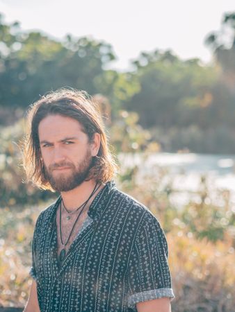 Hipster man near river