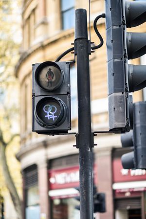 Pedestrian lights with 2 intersecting female gender symbol