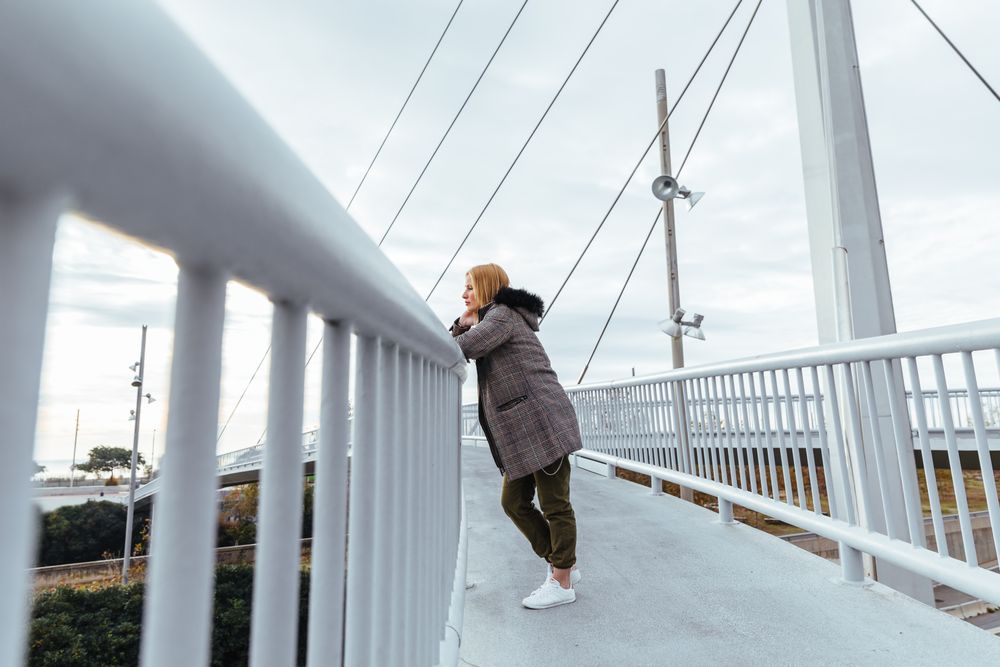 Blonde woman posing in the city