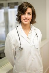 Young female doctor with stethoscope