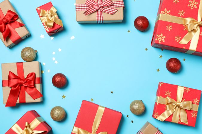 Composition with gift boxes on blue background, space for text