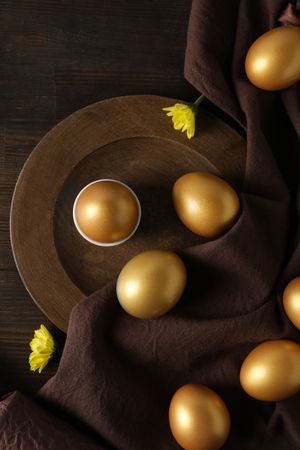 Concept of Richness, golden eggs, top view