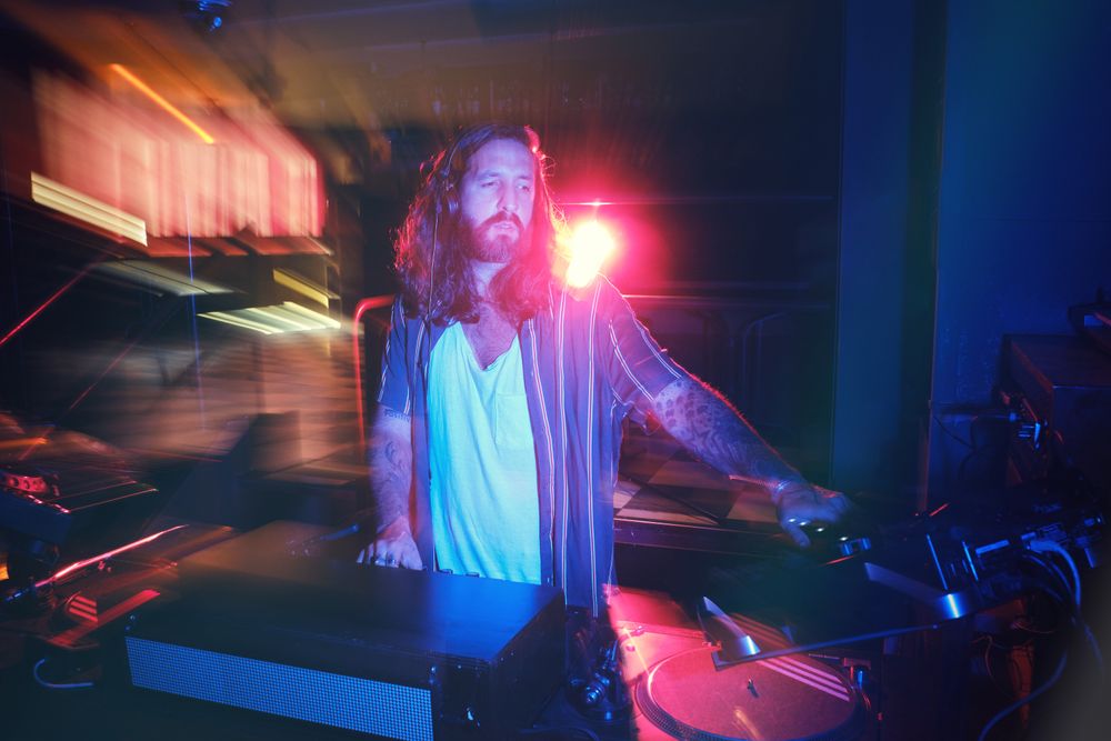 DJ playing song in club