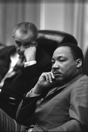 Martin Luther King, Jr. confers with President Lyndon Johnson in the Cabinet Room
