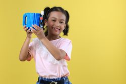 Asian Girl Kids Drink Water from Blue Cute Cup