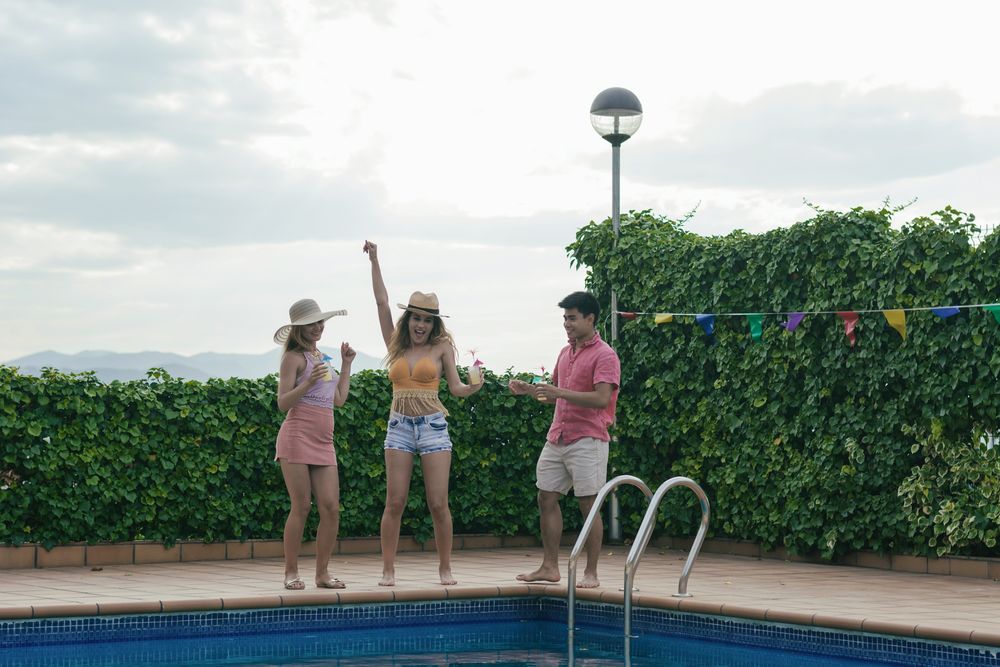 Group of friends having a pool party