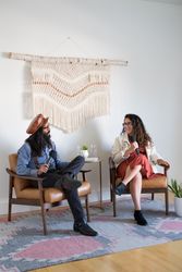Two people with microphones talking with each other