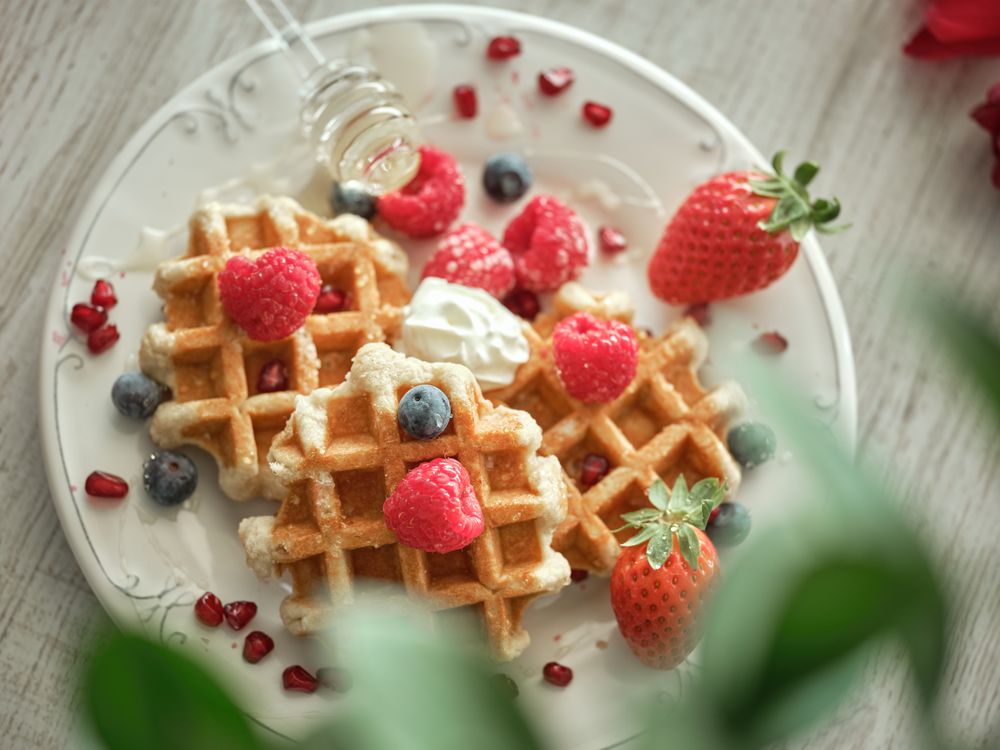 Tasty waffles served with berries