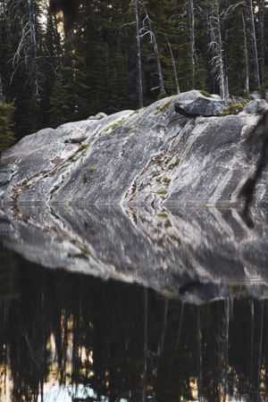 reflection of rock in water