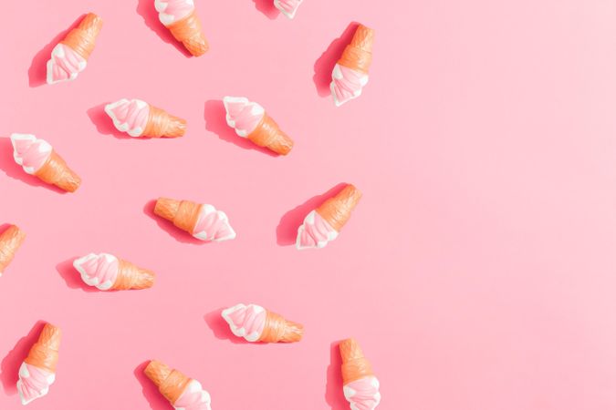 Ice cream in cones on pink background