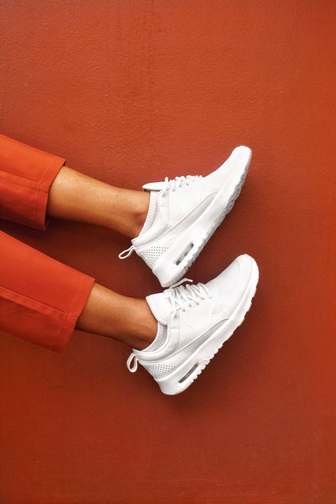 Person wearing light sneakers