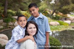 Happy Hispanic Mother and Sons bDjnPJ
