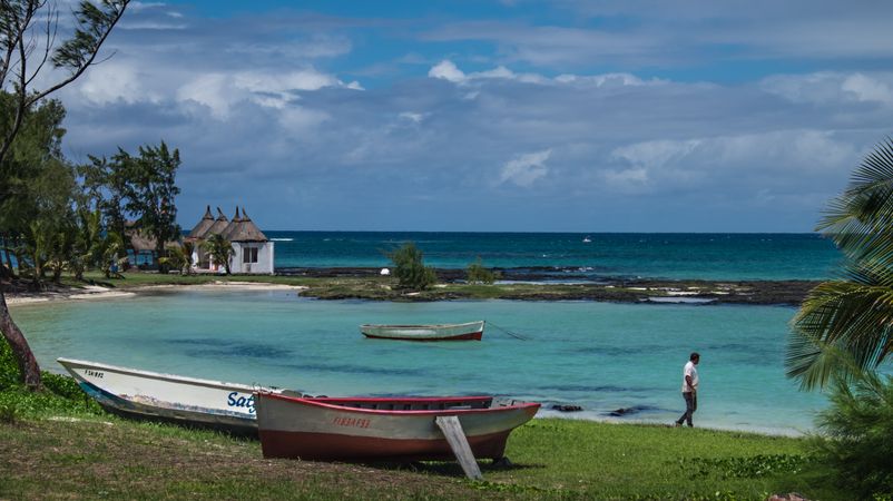 Beautiful lagoon in the Mauritius with boats and hut