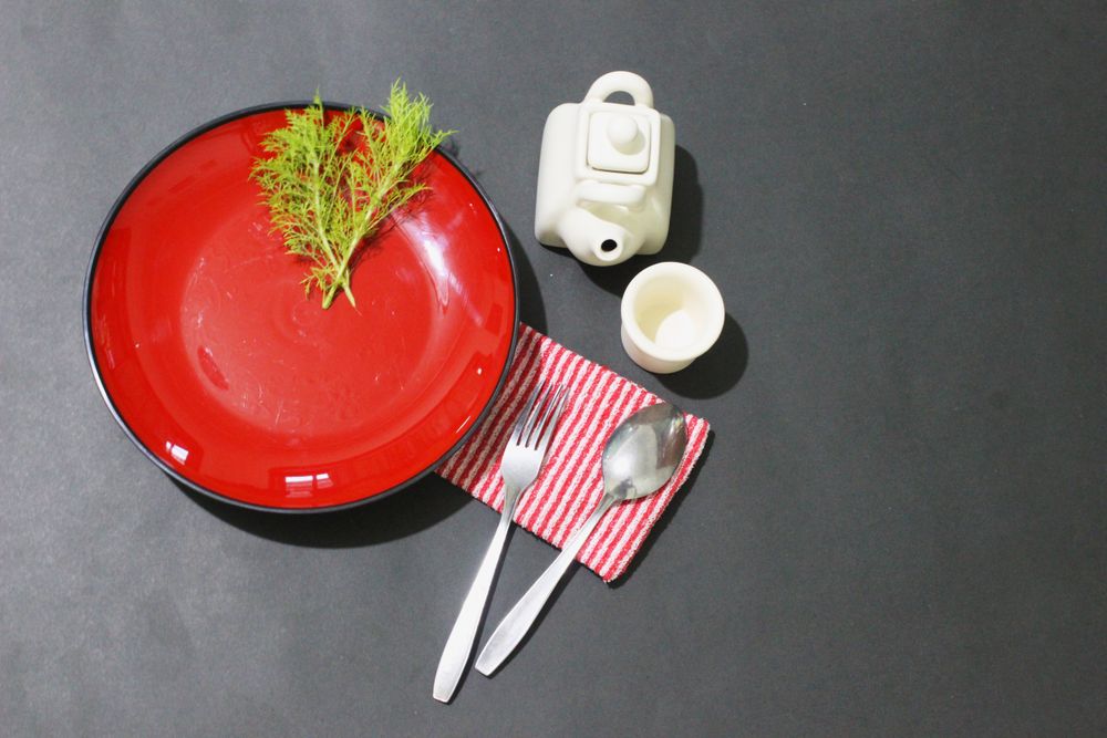Dinnerware setting with a Touch of Red and Black