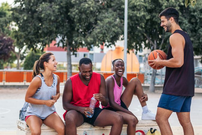 Group of multi-ethnic friends ready to play basketball