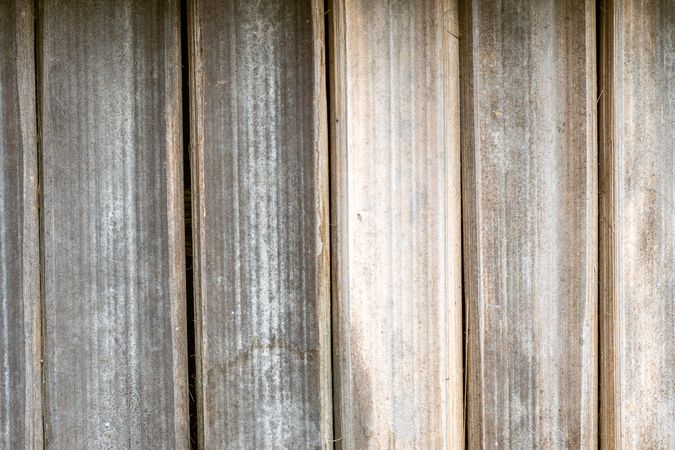 The image is of a wooden surface with a grainy texture