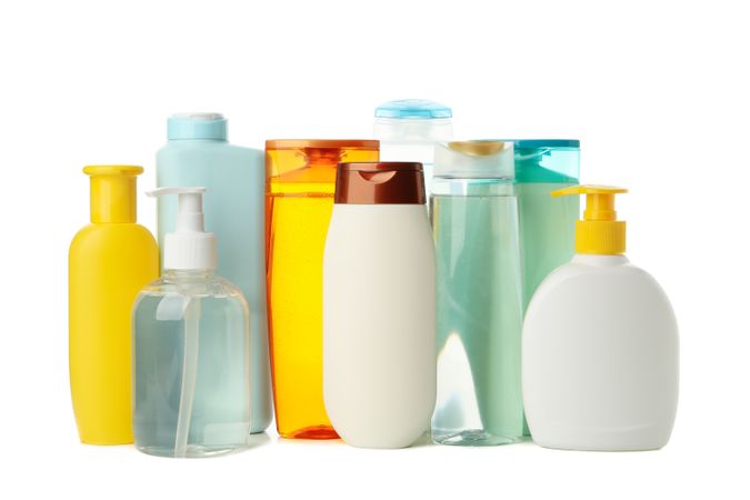 Blank bottles for cosmetics isolated on light background