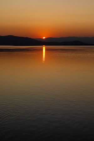 Sunset with reflections in the water