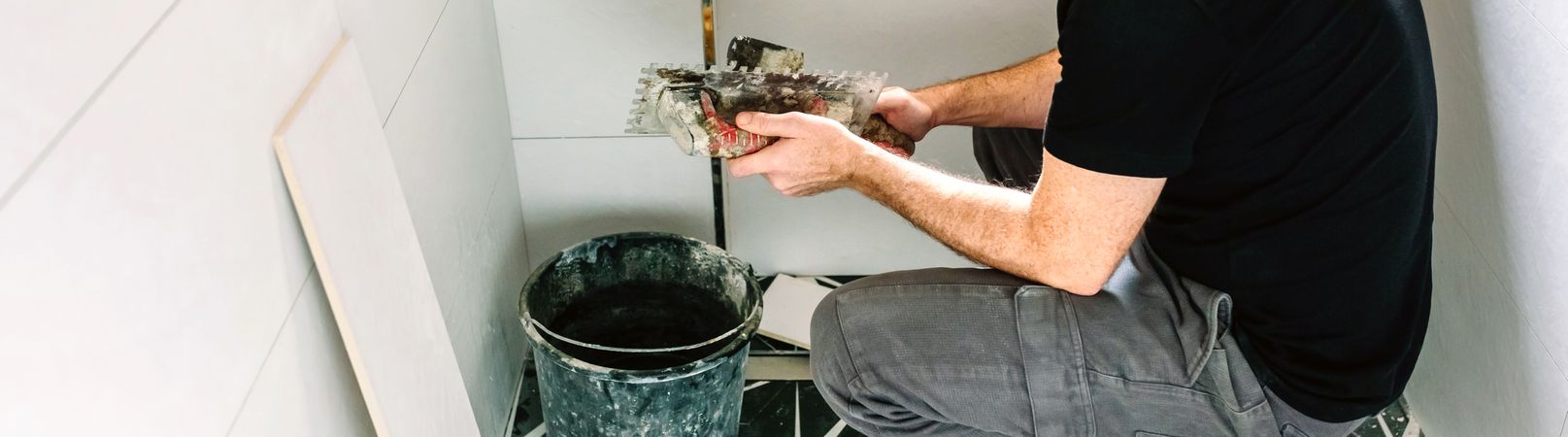 Mason working on a bathroom renovation