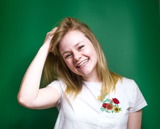 Blonde woman posing in studio