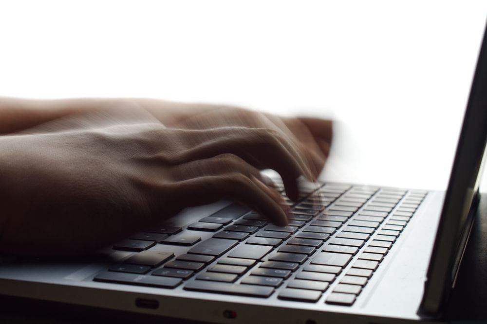 fast typing on laptop