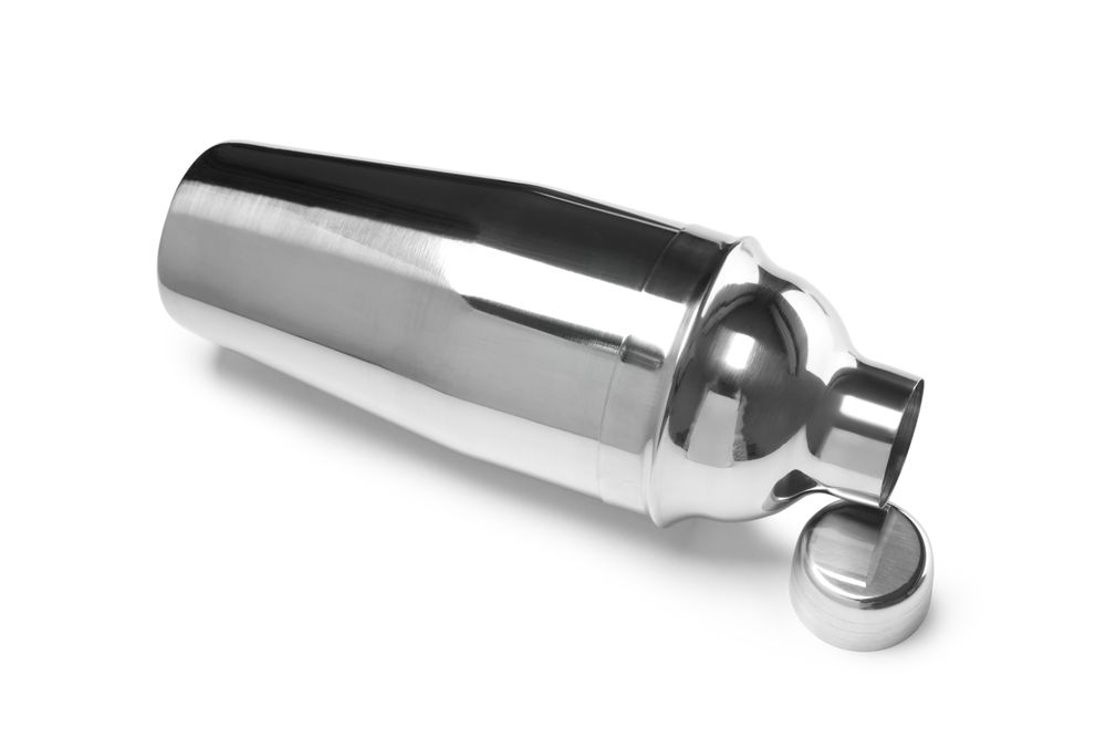 Concept of preparing alcohol drink or cocktail, shaker, isolated on plain background