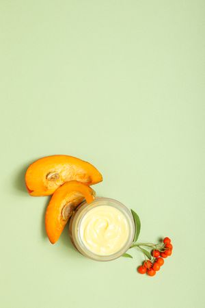 Skin care and face care concept - pumpkin cosmetic
