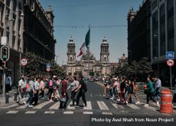 People walking across street in front of El Zocalo in Mexico City 43oLx4