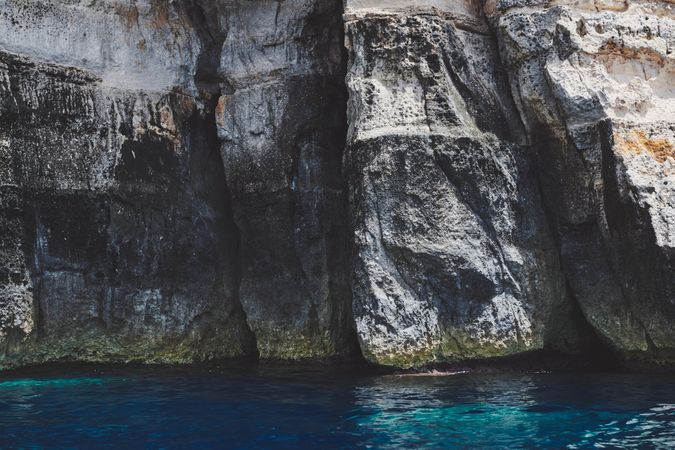 Cliffs along the blue water of the Mediterranean Sea
