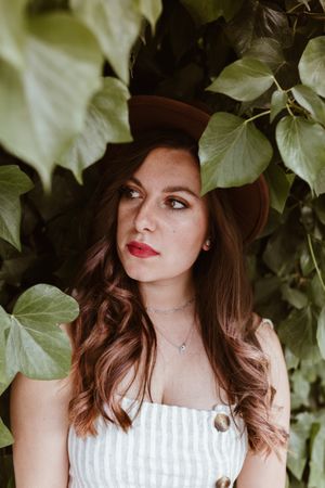 Woman with mysterious glance looking away