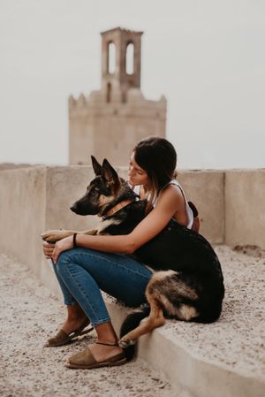 Woman with cute shepherd