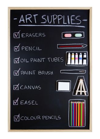 Art supplies over chalkboard background