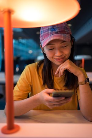 Asian woman browsing on smartphone
