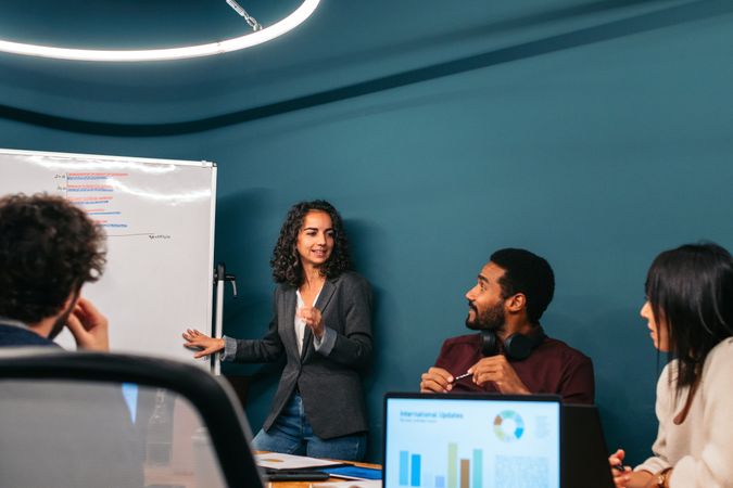 Group of people working with laptop in a coworking