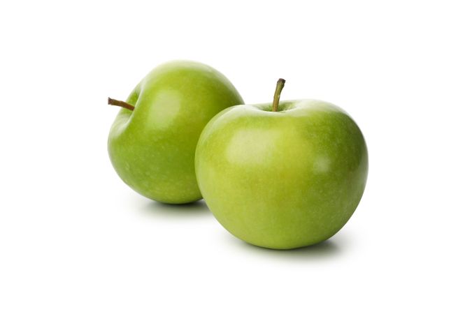 Two green apples isolated on blank background