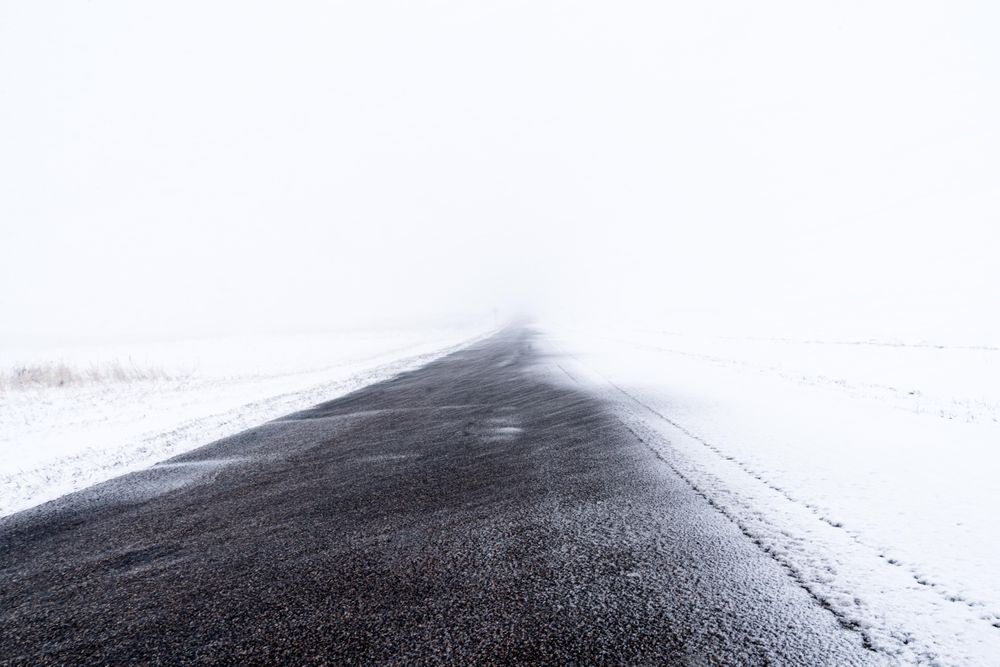 Snowdrift covered road