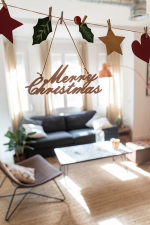 Light modern room decorated for Christmas